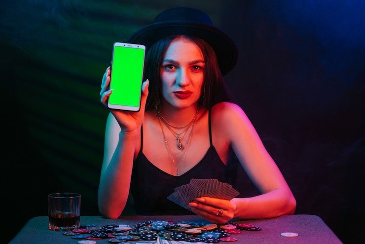 Player interface showing live dealer card game with betting buttons and account balance